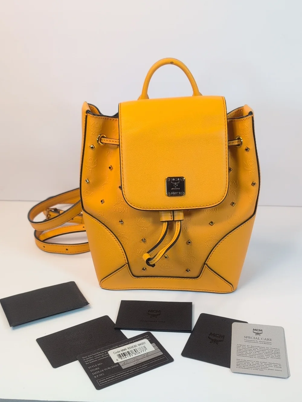 MCM Claudia Yellow Monogram Studded Backpack - Picture 2 of 13